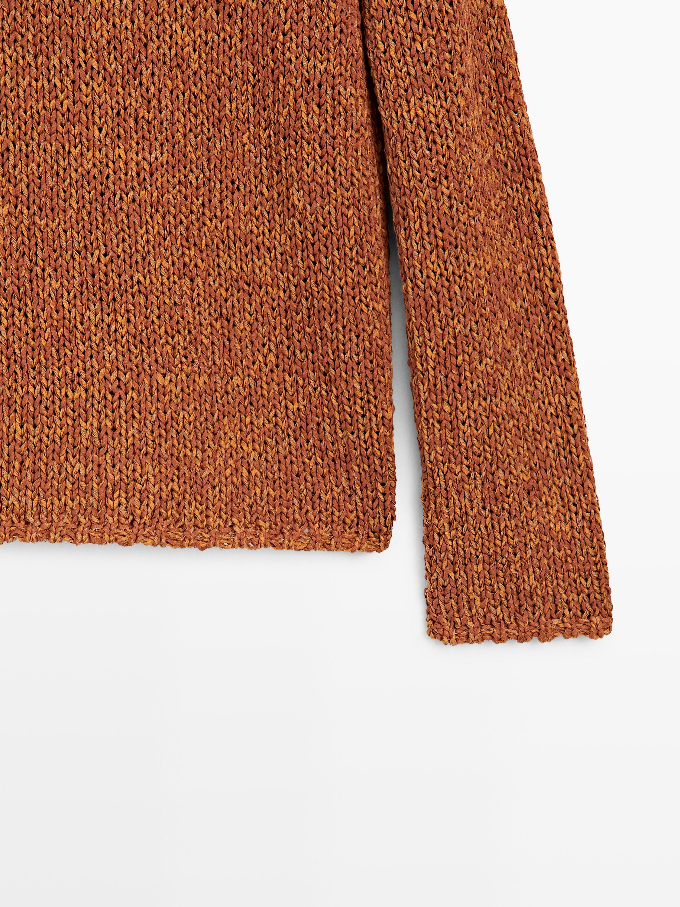 Pull en maille ajourée avec du coton